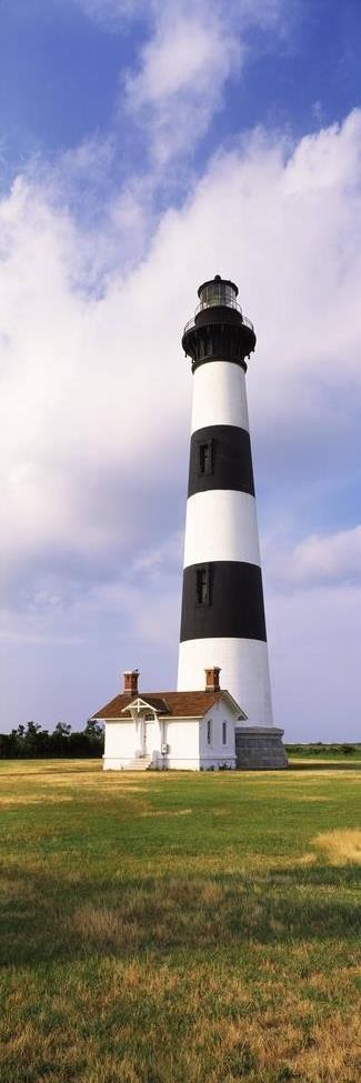 Everett Blake - Low Angle View of a Black and White Lighthouse